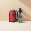 Red outdoor hiking backpack, large-capacity rainproof and wear-resistant travel bag Application Scenario